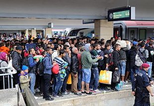 photo de réfugiés à la gare de Vienne
