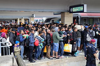photo de réfugiés à la gare de Vienne