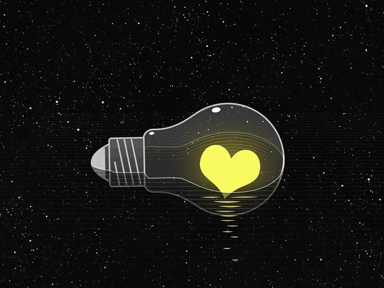 Ampoule avec un cœur jaune allumé à l'intérieur