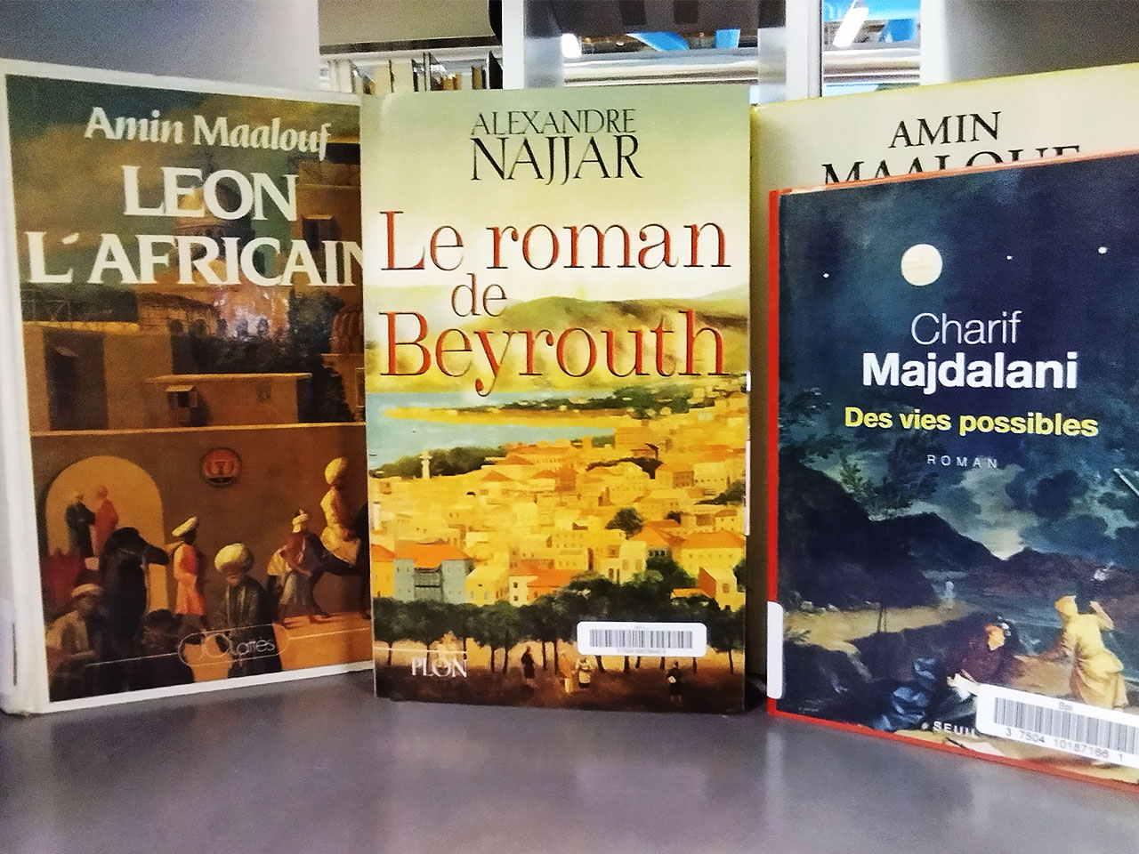 Premières de couverture des livres : Le roman de Beyrouth d'Alexandre Najjar, Léon l'africain d'Amin Maalouf et des vies possibles de Charif Madjdalani