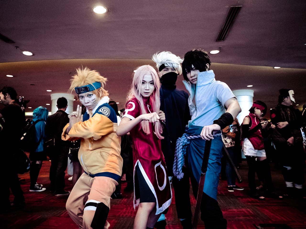 Quatre personnages pratiquant le Cosplay