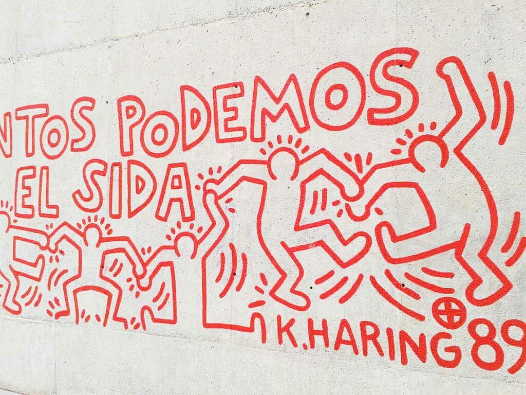 Détail de la fresque "Tous ensemble nous pouvons arrêter le Sida" (Barcelone, 1989) de Keith Haring.